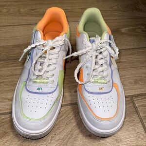 Nike Air Force 1 in White, Neon Orange, Neon Green, and Purple